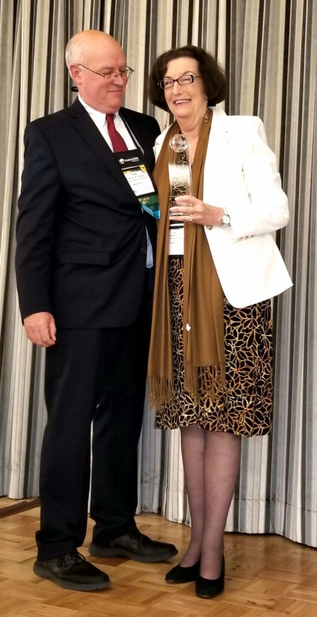 IMG_3314 API employee Elizabeth Adams receiving NAFSA Region VII International Excellence Award