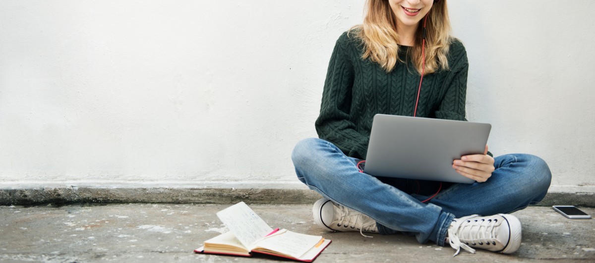 student-on-laptop-on-floor-101699-cropped