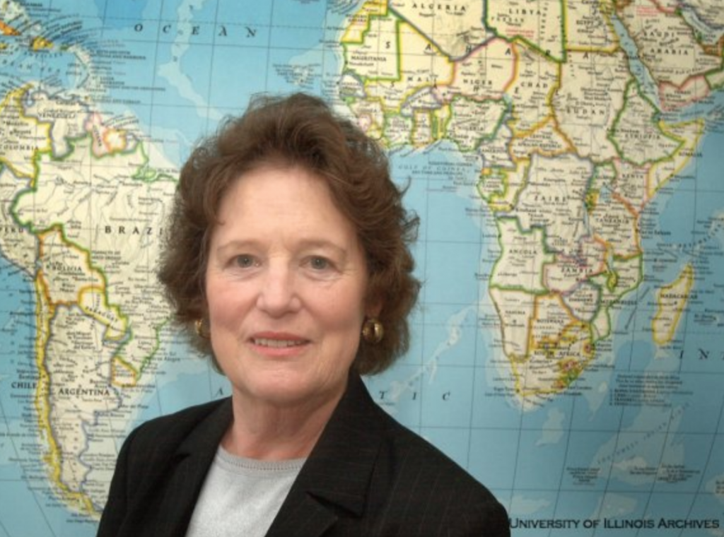 Joan Solaún stands in front of a world map