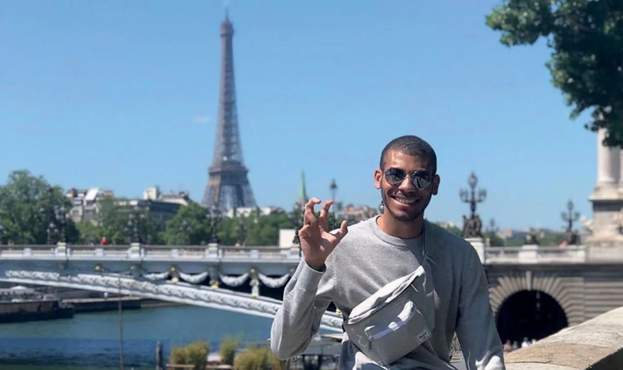 Student at Eiffel Tower in Paris